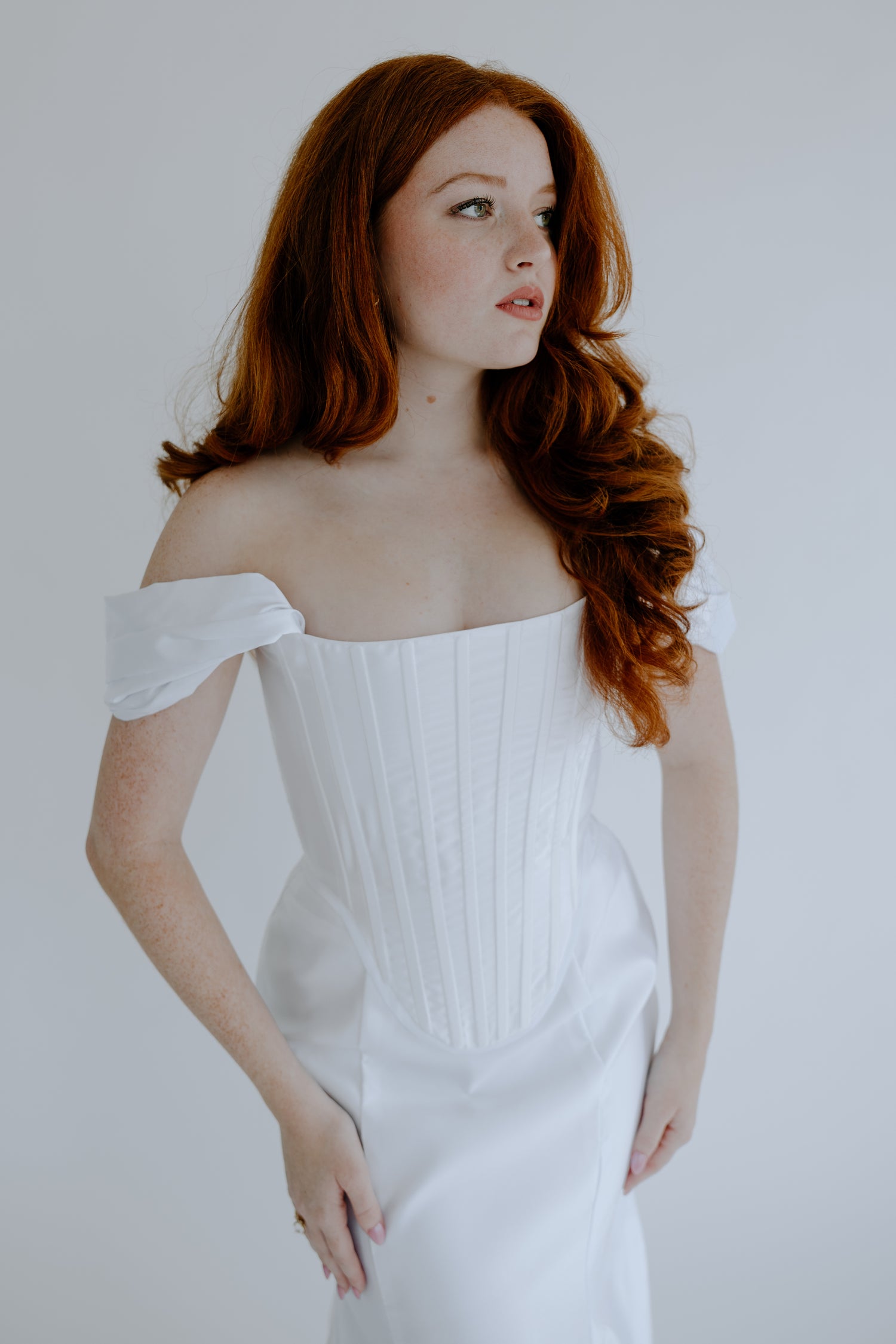 model wearing luxury wedding dress by house of adriana